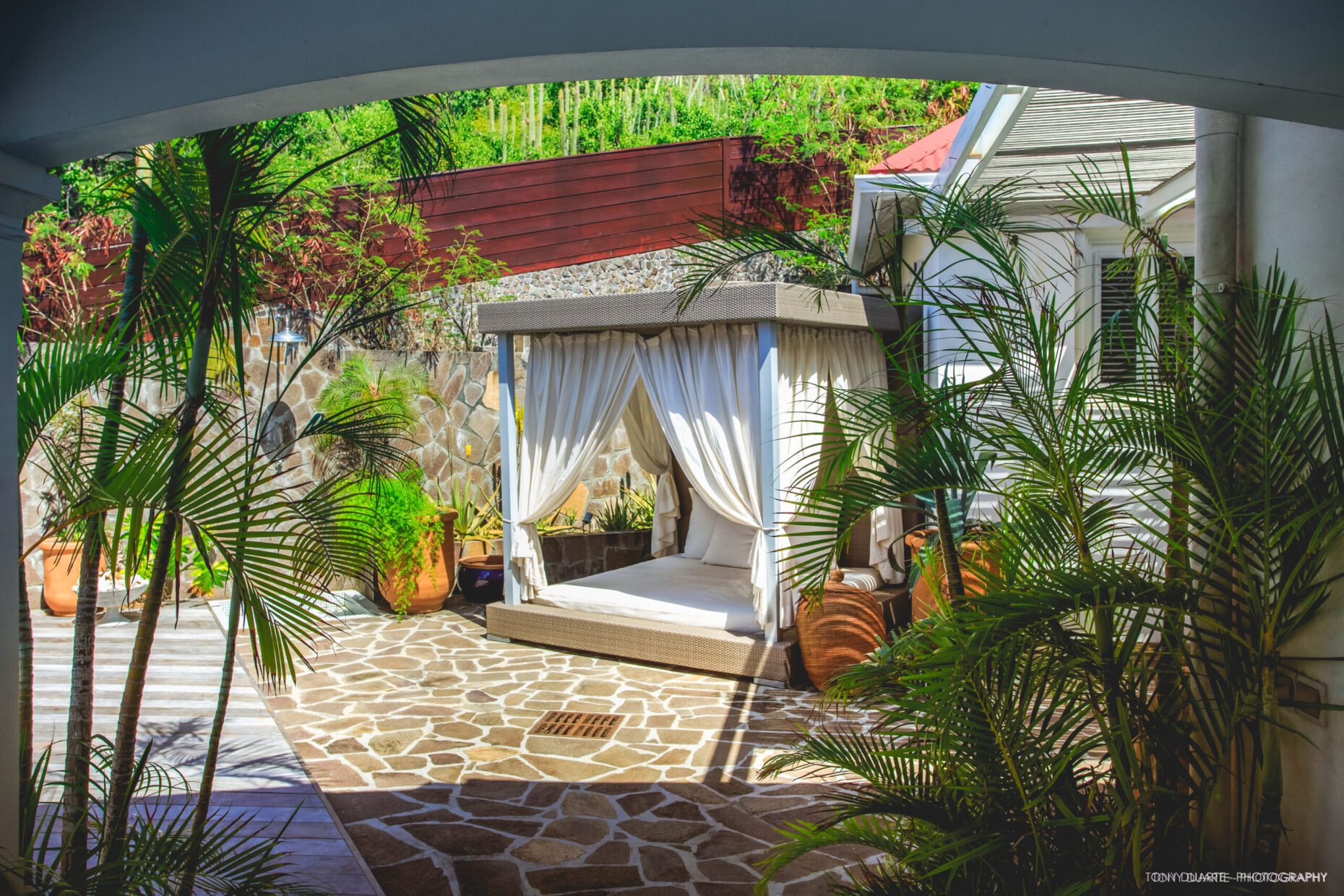 Villa Xanadu private courtyard with luxury daybed.